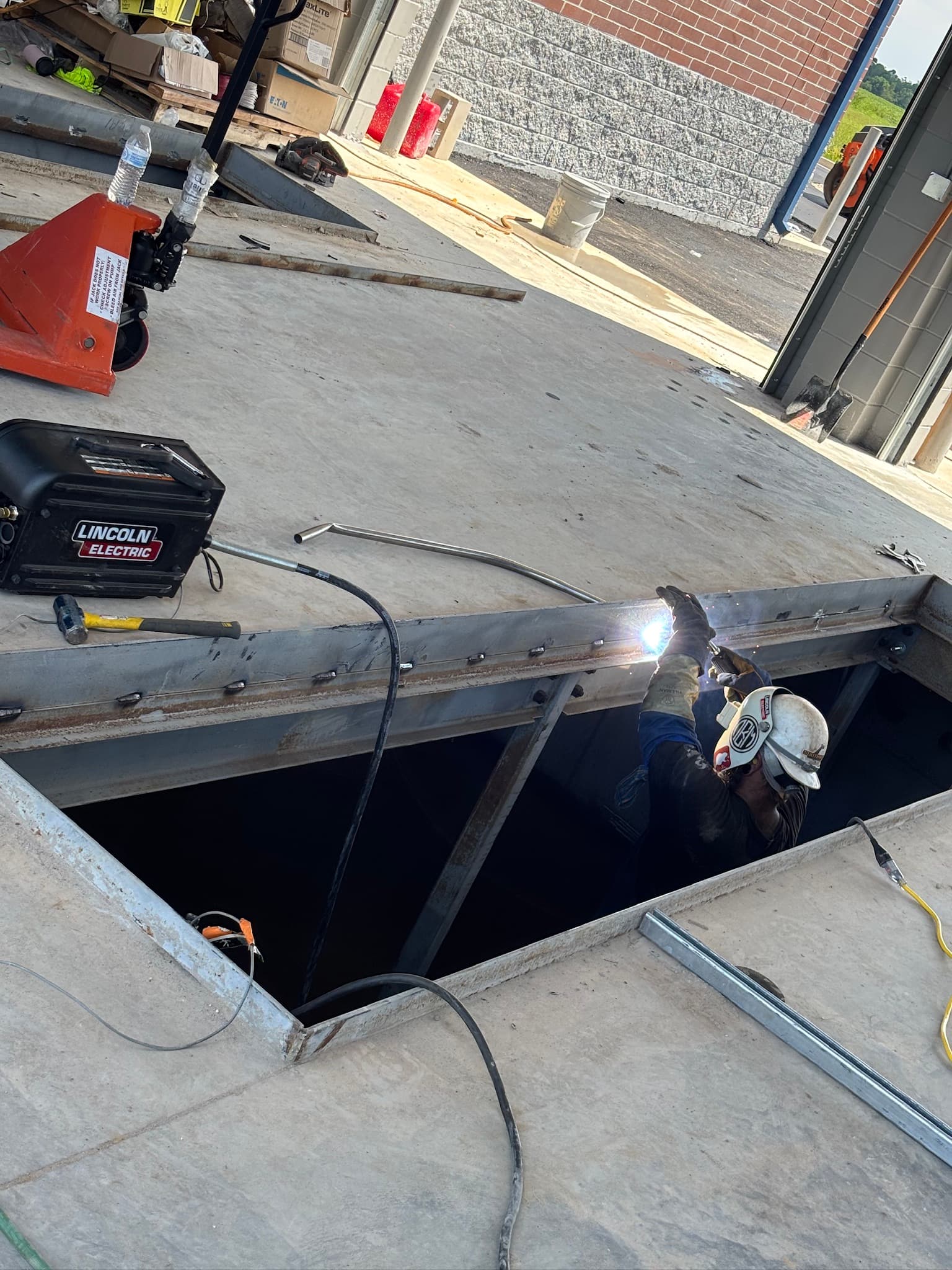 Elevator shaft welding with Lincoln Electric